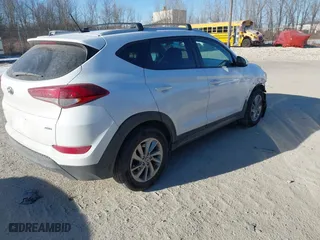 2016 Hyundai Tucson SE with VIN KM8J3CA42GU092788, listed as a IAAI auction lot 41297860 with 98,380 mi miles. Bid and sale history available at carsss.com. Image 4.