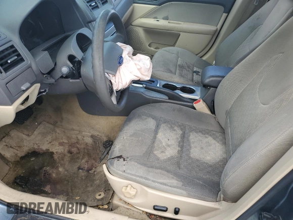 2012 Ford Fusion SE z VIN 3FAHP0HA1CR372744, wystawiony jako Copart lot #59118315 z przebiegiem Nie podano mil oraz Szkoda całkowita • Salvage title. Historia ofert i sprzedaży dostępna na DreamBid. Obrazek 7.