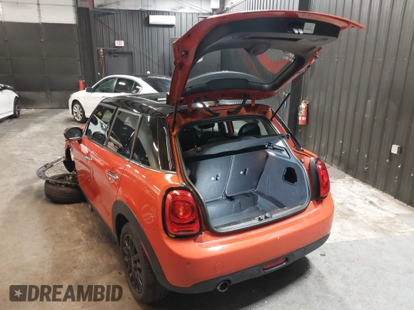 2019 MINI Hardtop 4 Door Cooper with VIN WMWXU1C58K2F82579, listed as a IAAI auction lot 42417562 with 45,915 mi miles and . Bid and sale history available at DreamBid. Image 3.