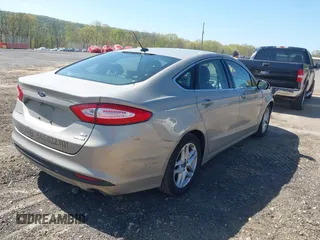 2016 Ford Fusion SE with VIN 3FA6P0HD8GR117421, listed as a IAAI auction lot 42146157 with 136,947 mi miles. Bid and sale history available at carsss.com. Image 4.