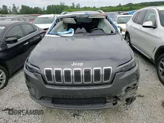 2019 Jeep Cherokee Latitude Plus with VIN 1C4PJLLN0KD119876, listed as a Copart auction lot 60462765 with 61,909 mi miles and Salvage title. Bid and sale history available at DreamBid. Image 13.