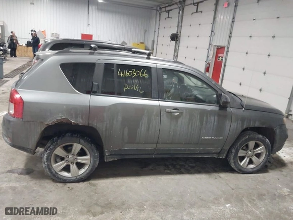2011 Jeep Compass with VIN 1J4NF1FB8BD239417, listed as a IAAI auction lot 41603066 with 165,938 mi miles. Bid and sale history available at carsss.com. Image 13.