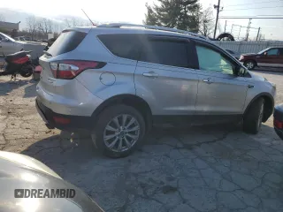2017 Ford Escape Titanium with VIN 1FMCU9J95HUA48080, listed as a Copart auction lot 83202034 with 122,528 mi miles and Salvage Title. Bid and sale history available at carsss.com. Image 3.