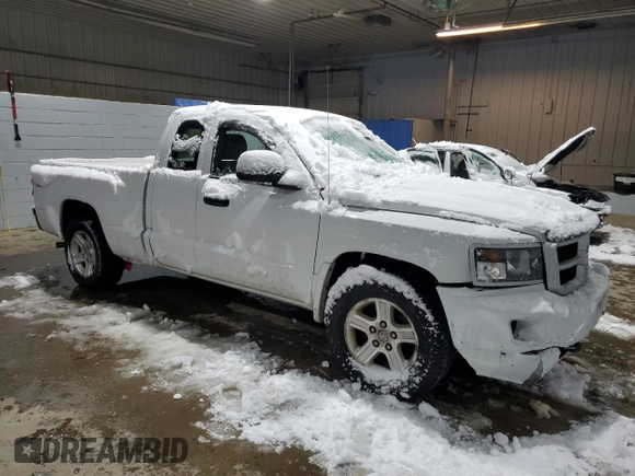 2011 Ram Dakota Bighorn/Lonestar with VIN 1D7RW3BK0BS638560, listed as a Copart auction lot 83523944 with 128,215 mi miles and Salvage Title. Bid and sale history available at carsss.com. Image 4.