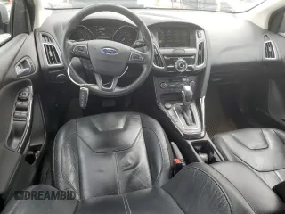 2016 Ford Focus Titanium with VIN 1FADP3J22GL354941, listed as a Copart auction lot 54401135 with 144,142 mi miles and Salvage title. Bid and sale history available at DreamBid. Image 8.