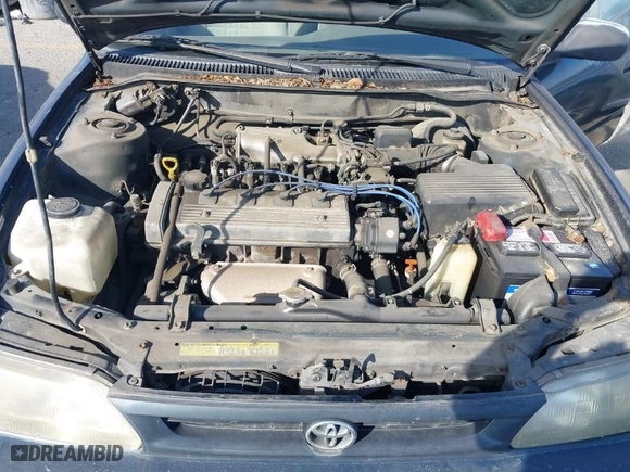 1997 Toyota Corolla with VIN 1NXBA02E5VZ595972, listed as a IAAI auction lot 41622050 with 143,577 mi miles. Bid and sale history available at carsss.com. Image 10.