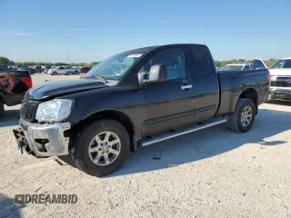 2006 Nissan Titan SE with VIN 1N6BA06B96N521452, listed as a Copart auction lot 70101084 with 197,101 mi miles and Salvage Title. Bid and sale history available at carsss.com. Image 1.