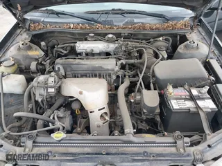 2000 Toyota Camry CE with VIN JT2BG22KXY0499280, listed as a IAAI auction lot 42075329 with 321,420 mi miles. Bid and sale history available at carsss.com. Image 10.