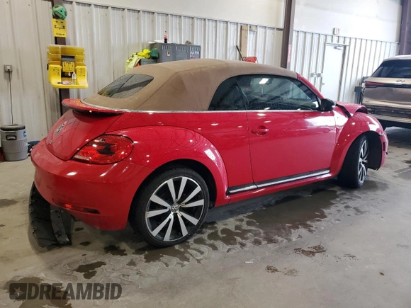 2015 Volkswagen Beetle with VIN 3VW7S7AT1FM822318, listed as a Copart auction lot 71398644 with 73,421 mi miles and Salvage Title. Bid and sale history available at DreamBid. Image 3.