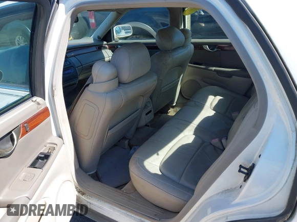 2004 Cadillac DeVille z VIN 1G6KD54Y74U129218, wystawiony jako IAAI lot #41786756 z przebiegiem 167 125 mil mil oraz . Historia ofert i sprzedaży dostępna na DreamBid. Obrazek 8.