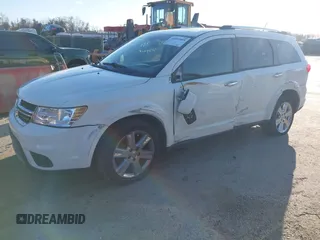 2013 Dodge Journey Crew with VIN 3C4PDCDG3DT521556, listed as a IAAI auction lot 41852888 with 209,562 mi miles and . Bid and sale history available at DreamBid. Image 2.