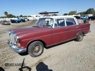 1966 Mercedes-Benz E with VIN 110C1012157487, listed as a Copart auction lot 81770344 with 68,662 mi miles and Salvage Title. Bid and sale history available at DreamBid. Image 1.