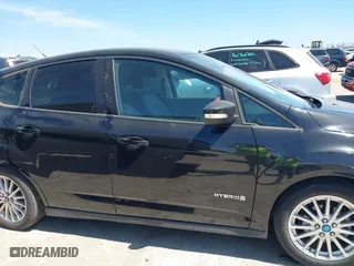 2013 Ford C-Max Hybrid SE with VIN 1FADP5AU3DL519923, listed as a IAAI auction lot 41865952 with 211,115 mi miles. Bid and sale history available at carsss.com. Image 13.