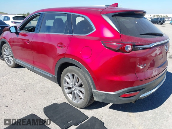 2023 Mazda CX-9 Grand Touring with VIN JM3TCBDY7P0632706, listed as a IAAI auction lot 41003307 with 44,221 mi miles and . Bid and sale history available at carsss.com. Image 3.