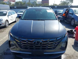 2022 Hyundai Tucson SEL with VIN 5NMJCCAEXNH061242, listed as a IAAI auction lot 41866145 with 63,501 mi miles and . Bid and sale history available at carsss.com. Image 11.