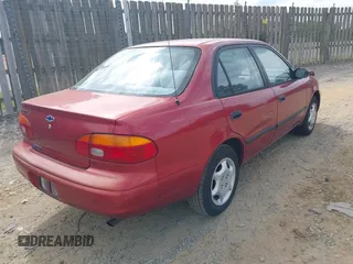 2001 Chevrolet Prizm with VIN 1Y1SK52891Z422344, listed as a IAAI auction lot 42095405 with 57,891 mi miles. Bid and sale history available at carsss.com. Image 4.