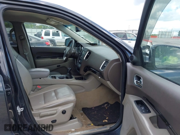 2013 Dodge Durango Crew with VIN 1C4RDHDG7DC657898, listed as a IAAI auction lot 42522353 with 234,483 mi miles and . Bid and sale history available at DreamBid. Image 5.