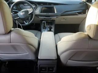 2020 Cadillac XT4 FWD Premium Luxury z VIN 1GYFZCR49LF118146, wystawiony jako Copart lot #82495614 z przebiegiem Nie podano mil oraz Nie do naprawy • Non repairable. Historia ofert i sprzedaży dostępna na DreamBid. Obrazek 8.