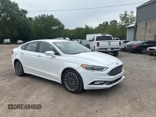 2017 Ford Fusion Titanium с VIN 3FA6P0K96HR146518, выставлен на аукционе Copart как лот 57852665 с пробегом 170 894 миль миль и Чистый • Clean title. История ставок и продаж доступна на DreamBid. Изображение 1.