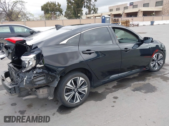 2016 Honda Civic Sedan EX-L with VIN 19XFC1F72GE217515, listed as a IAAI auction lot 41893795 with 130,703 mi miles. Bid and sale history available at carsss.com. Image 4.