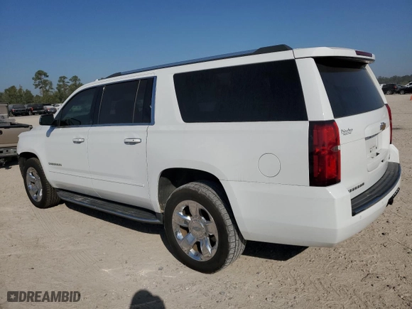 2017 Chevrolet Suburban Premier with VIN 1GNSCJKC7HR128988, listed as a Copart auction lot 73958784 with 121,662 mi miles and Salvage Title. Bid and sale history available at carsss.com. Image 2.