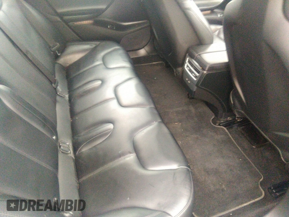 2016 Tesla Model S 70 with VIN 5YJSA1E13GF174542, listed as a IAAI auction lot 41169279 with 72,691 mi miles and . Bid and sale history available at DreamBid. Image 8.