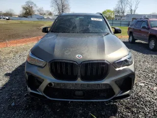 2023 BMW X5 M z VIN 5YMJU0C01P9P15368, wystawiony jako Copart lot #50782505 z przebiegiem Nie podano mil oraz Szkody całkowita. Historia ofert i sprzedaży dostępna na DreamBid. Obrazek 5.