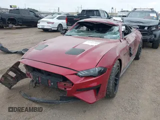 2018 Ford Mustang GT with VIN 1FA6P8CF2J5171122, listed as a IAAI auction lot 41214704 with 95,972 mi miles and . Bid and sale history available at DreamBid. Image 2.