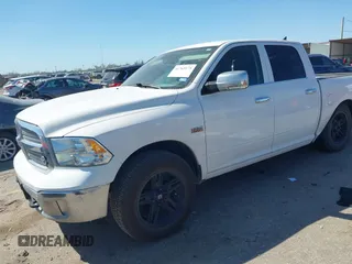 2018 Ram 1500 Lone Star Silver z VIN 1C6RR6LT0JS245223, wystawiony jako IAAI lot #41765175 z przebiegiem 128 156 mil mil oraz . Historia ofert i sprzedaży dostępna na DreamBid. Obrazek 2.