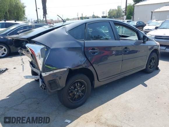 2015 Toyota Prius Four with VIN JTDKN3DU9F0473025, listed as a IAAI auction lot 42425733 with 124,196 mi miles and . Bid and sale history available at DreamBid. Image 4.