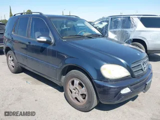 2002 Mercedes-Benz M-Class with VIN 4JGAB54E82A323495, listed as a IAAI auction lot 41848530 with 161,317 mi miles. Bid and sale history available at carsss.com. Image 1.