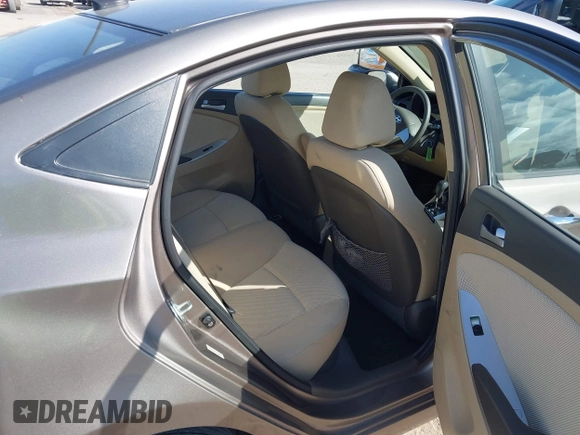 2012 Hyundai Accent GLS with VIN KMHCT4AE4CU097413, listed as a IAAI auction lot 42024571 with 120,672 mi miles. Bid and sale history available at carsss.com. Image 8.