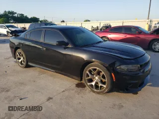 2015 Dodge Charger SXT z VIN 2C3CDXHG0FH866849, wystawiony jako Copart lot #52026055 z przebiegiem 111 043 mil mil oraz Szkoda całkowita • Salvage title. Historia ofert i sprzedaży dostępna na DreamBid. Obrazek 4.