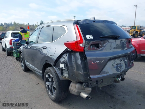 2017 Honda CR-V Touring with VIN 2HKRW2H95HH646184, listed as a IAAI auction lot 41906341 with 58,529 mi miles. Bid and sale history available at carsss.com. Image 3.