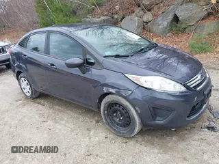 2012 Ford Fiesta SE with VIN 3FADP4BJ3CM152310, listed as a IAAI auction lot 42028398 with 124,530 mi miles and . Bid and sale history available at carsss.com. Image 1.