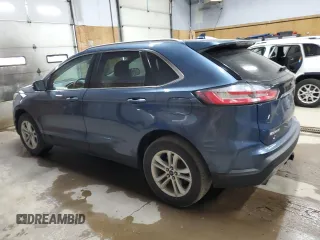 2019 Ford Edge SEL z VIN 2FMPK4J96KBB12912, wystawiony jako Copart lot #61029835 z przebiegiem 93 474 mil mil oraz Czysty tytuł • Clean title. Historia ofert i sprzedaży dostępna na DreamBid. Obrazek 2.