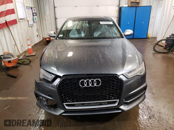 2016 Audi S6 Premium Plus z VIN WAUF2AFC4GN100284, wystawiony jako Copart lot #86496964 z przebiegiem 100 537 mil mil oraz Szkody całkowita. Historia ofert i sprzedaży dostępna na DreamBid. Obrazek 5.