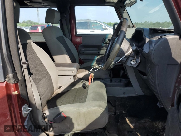 2008 Jeep Wrangler X with VIN 1J4FZ24128L526519, listed as a Copart auction lot 62807345 with 226,657 mi miles and Clean title. Bid and sale history available at DreamBid. Image 7.