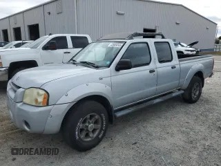 2003 Nissan Frontier SE z VIN 1N6ED29X33C413665, wystawiony jako Copart lot #43689245 z przebiegiem 188 345 mil mil oraz Szkoda całkowita • Salvage title. Historia ofert i sprzedaży dostępna na DreamBid. Obrazek 1.