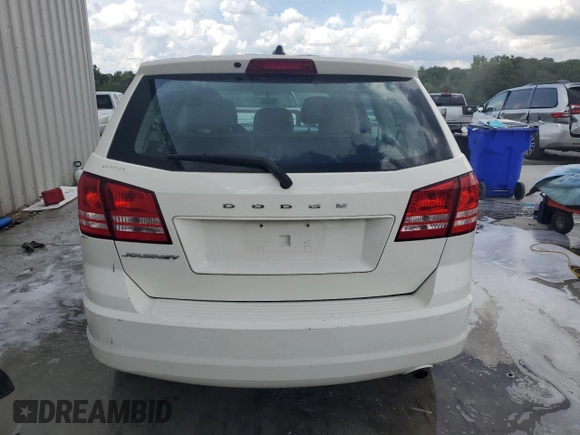 2014 Dodge Journey American Value with VIN 3C4PDCAB3ET216889, listed as a Copart auction lot 60874265 with 117,508 mi miles and Salvage title. Bid and sale history available at DreamBid. Image 6.