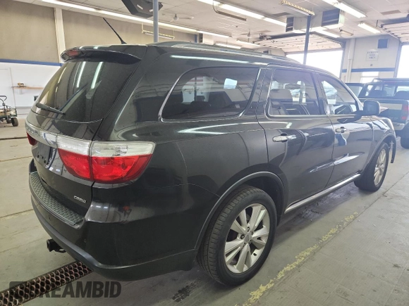2013 Dodge Durango Crew z VIN 1C4RDJDGXDC672239, wystawiony jako Copart lot #59227905 z przebiegiem 167 982 mil mil oraz Szkoda całkowita • Salvage title. Historia ofert i sprzedaży dostępna na DreamBid. Obrazek 3.