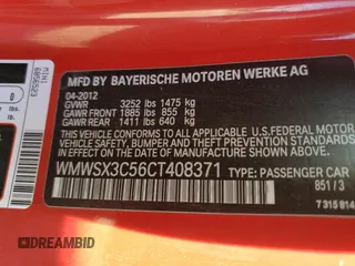 2012 MINI Coupe S z VIN WMWSX3C56CT408371, wystawiony jako Copart lot #73730514 z przebiegiem 95 786 mil mil oraz Szkody całkowita. Historia ofert i sprzedaży dostępna na DreamBid. Obrazek 14.