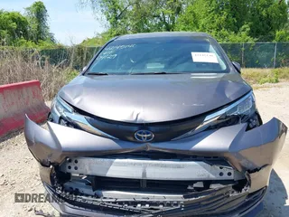 2021 Toyota Sienna LE with VIN 5TDKSKFC4MS004345, listed as a IAAI auction lot 42145140 with 103,544 mi miles and . Bid and sale history available at DreamBid. Image 12.