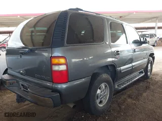2002 Chevrolet Tahoe LT with VIN 1GNEC13Z92R283677, listed as a IAAI auction lot 41767229 with 241,320 mi miles. Bid and sale history available at carsss.com. Image 4.