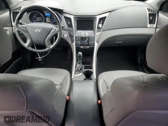 2012 Hyundai Sonata Hybrid with VIN KMHEC4A4XCA031479, listed as a Copart auction lot 55729195 with 175,054 mi miles and Clean Title. Bid and sale history available at DreamBid. Image 8.