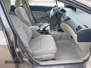 2012 Honda Civic LX with VIN 2HGFB2F57CH528266, listed as a IAAI auction lot 42094846 with 120,244 mi miles and . Bid and sale history available at DreamBid. Image 5.