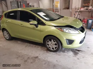 2013 Ford Fiesta SE with VIN 3FADP4EJ9DM131913, listed as a IAAI auction lot 41677333 with 54,673 mi miles. Bid and sale history available at carsss.com. Image 1.