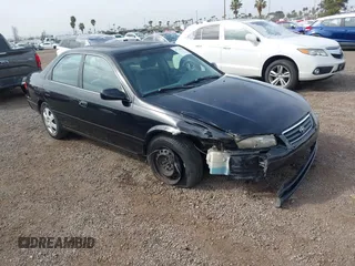 2001 Toyota Camry CE with VIN JT2BG22K910548345, listed as a IAAI auction lot 41723835 with 170,228 mi miles and . Bid and sale history available at DreamBid. Image 1.