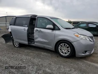 2015 Toyota Sienna XLE с VIN 5TDYK3DC7FS571431, выставлен на аукционе Copart как лот 57173595 с пробегом 305 940 миль миль и Списание • Salvage title. История ставок и продаж доступна на DreamBid. Изображение 4.