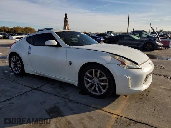 2013 Nissan 370Z with VIN JN1AZ4EH1DM381956, listed as a Copart auction lot 82839924 with 78,452 mi miles and Salvage Title. Bid and sale history available at carsss.com. Image 4.